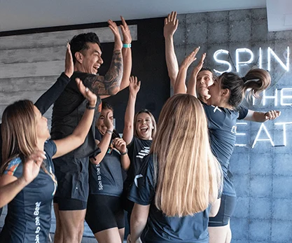 Apinning team cheering